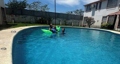 "Cozy house with pool and amenities.