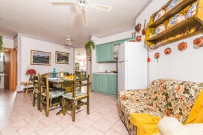 Standard Apartment, Multiple Bedrooms (Residence 4 Colonne) | Living area | 21-inch TV with satellite channels, stereo