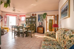 Standard Apartment, Multiple Bedrooms (Residence 4 Colonne) | Living area | 21-inch TV with satellite channels, stereo