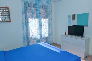 Comfort-Apartment, Balkon, eingeschränkter Meerblick | 2 Schlafzimmer, Daunenbettdecken, Verdunkelungsvorhänge