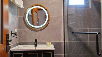 Shower, hair dryer, slippers, towels