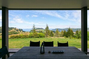 Outdoor dining - Peaceful Luxury Retreat - with Spa Pool, a spacious, beautiful, private property with stunning views (Taupō)