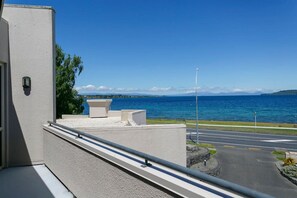 Property grounds - Lake Front Living - directly across from Lake Taupō. Spectacular deck views of lake and mountains (Taupo)