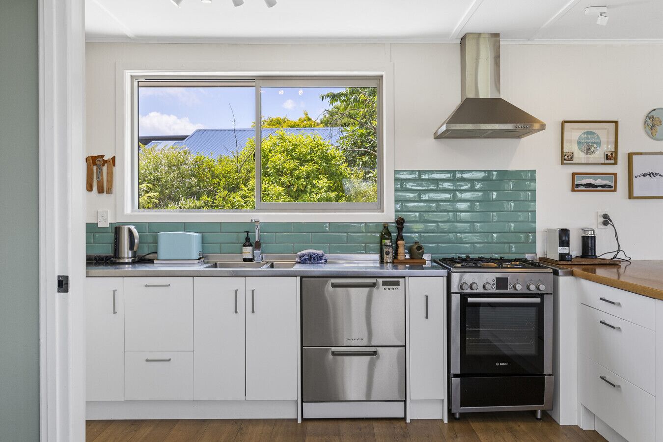 Fridge, stovetop, dishwasher, coffee/tea maker