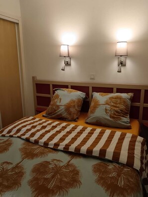 2 slaapkamers, een kluis op de kamer, een strijkplank/strijkijzer