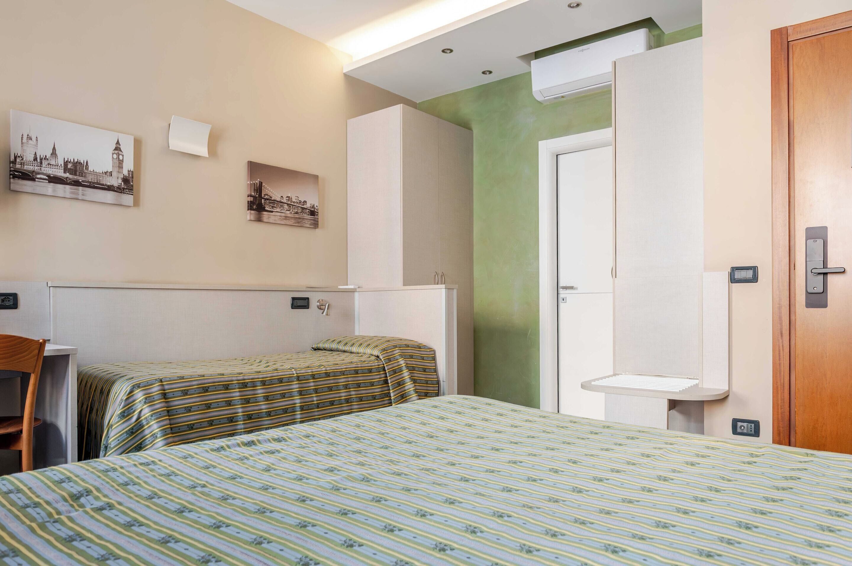 1 bedroom, laptop workspace, bed sheets