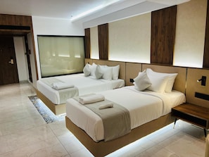 Deluxe Triple Room - Royal Plaza Inn by RAK Rooms (Kozhikode)