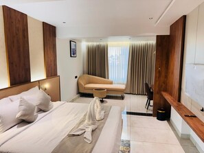 Chambre Double Deluxe | Draps en coton égyptien, literie de qualité supérieure