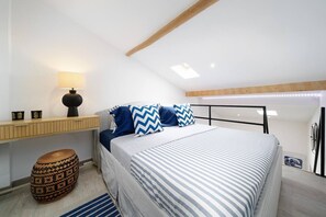 1 dormitorio, tabla de planchar con plancha, wifi gratis y ropa de cama