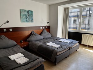 Desk, laptop workspace, free WiFi, bed sheets