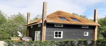 Maison de vacances confortable avec jardin