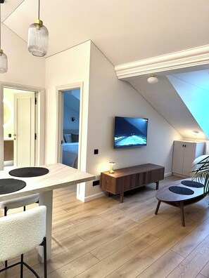 Apartamento, 1 habitación, vistas a la ciudad | Sala de estar