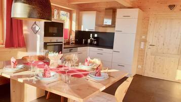 Fridge, oven, dishwasher, dining tables