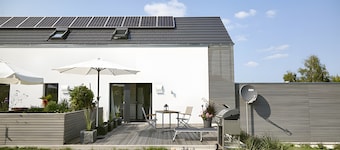 Studio 'Charmingsuite' avec terrasse privée, jardin partagé et Wi-Fi