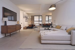 Appartement (2 Bedrooms) | Coin séjour | Télévision à écran plat de 32 pouces avec chaînes par câble