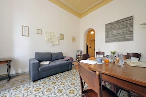 Apartment (2 Bedrooms) | Living area | 32-inch Smart TV with cable channels