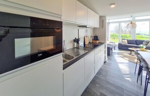 Fridge, microwave, dishwasher, cookware/dishes/utensils