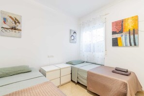 2 dormitorios, tabla de planchar con plancha, wifi y ropa de cama