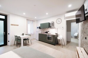 Classic Studio, Balcony | Private kitchen | Espresso maker, coffee/tea maker, electric kettle, spices