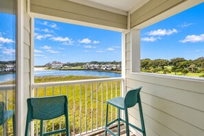 Comfy seating on this beachside balcony takes in Myrtle Beach`s Shore Drive coastline in full view. - Oceanfront Resort 2Br Condo Pools and Hot Tubs (Myrtle Beach)