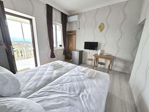 cozy house with amazing views to the mountains and whole city