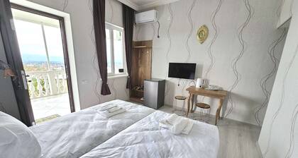 cozy house with amazing views to the mountains and whole city