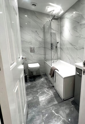 Hair dryer, towels, soap, toilet paper