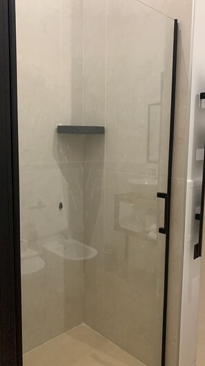 Shower, eco-friendly toiletries, hair dryer, bidet