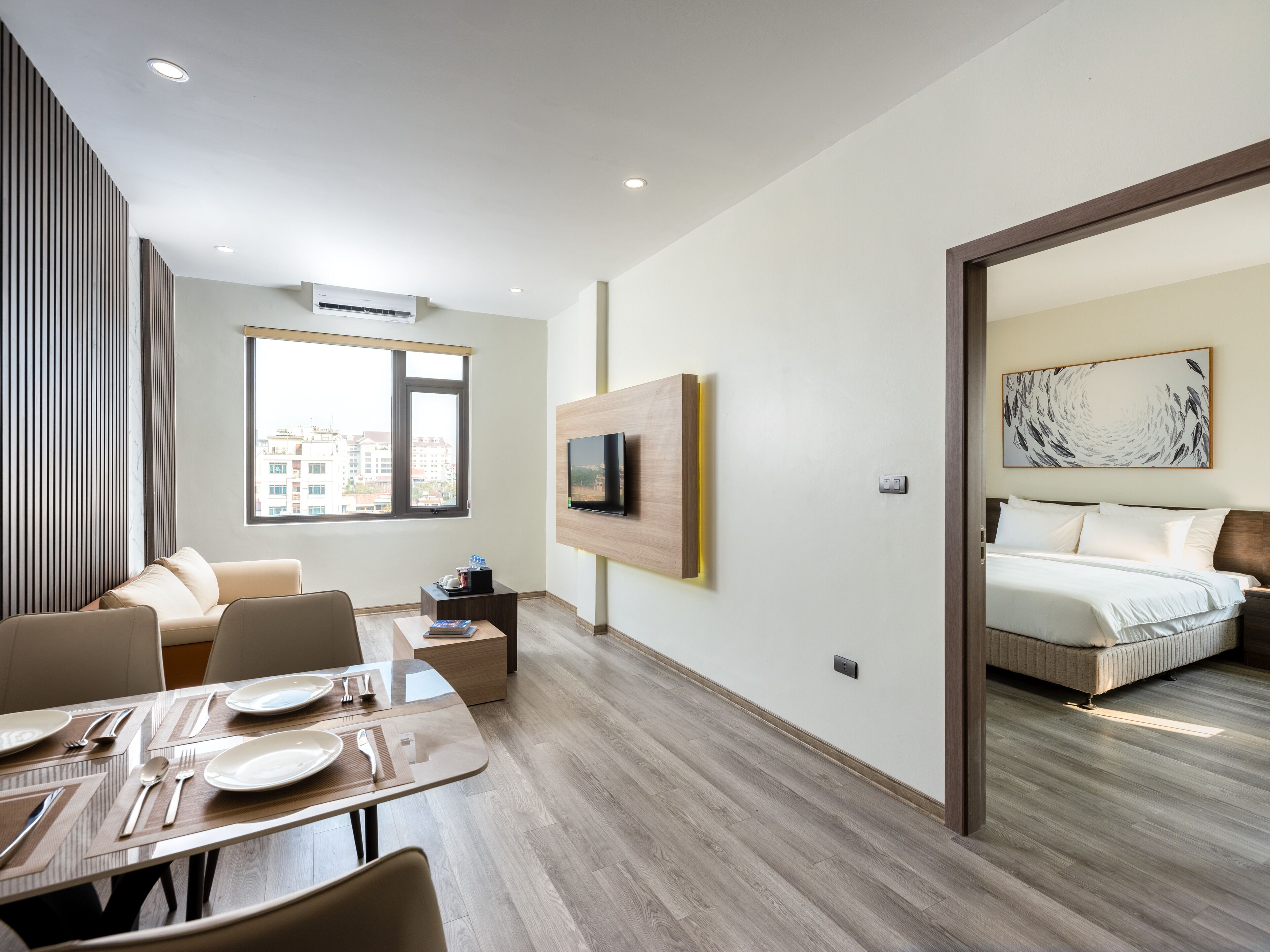 Luxury Suite, City View | Living area | 25-inch flat-screen TV with digital channels, printers