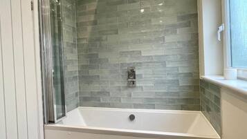 Shower, towels, toilet paper