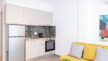 Apartment, 1 Bedroom | Private kitchen | Full-sized fridge, microwave, oven, espresso maker