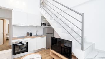Standard Loft | Private kitchen | Full-sized fridge, microwave, oven, espresso maker