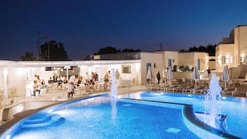 Outdoor pool, open noon to 7:00 PM, pool umbrellas, pool loungers