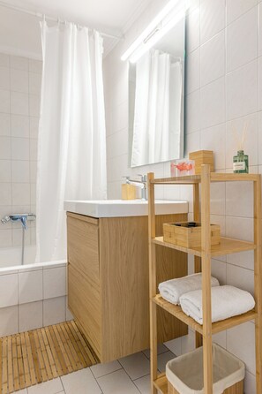 Hair dryer, towels, soap, toilet paper