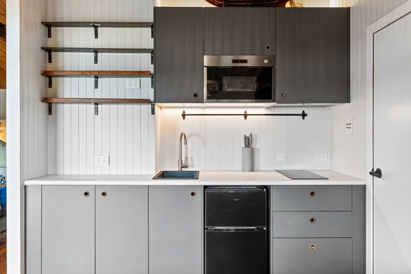 Fridge, microwave, stovetop, coffee/tea maker