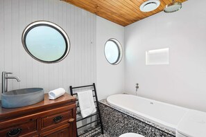 Shower, hair dryer, towels, shampoo