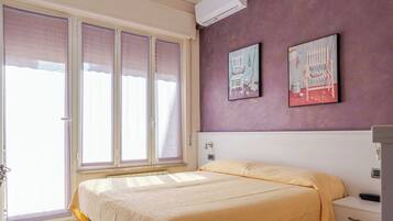 1 bedroom, laptop workspace, bed sheets