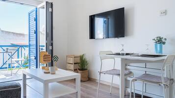 Apartment, 1 Bedroom, Kitchen, Garden View | Living room | 43-inch Smart TV with digital channels, streaming services