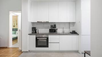 Basic Apartment, 2 Bedrooms, Kitchen, City View | Private kitchen | Full-size fridge, microwave, oven, stovetop