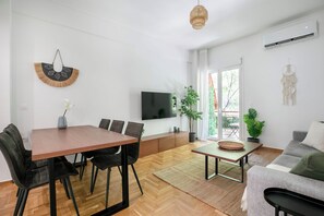 Basic Apartment, 2 Bedrooms, Kitchen, City View | Living area | 42-inch Smart TV with cable channels, streaming services