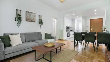 Basic Apartment, 2 Bedrooms, Kitchen, City View | Living area | 42-inch Smart TV with cable channels, streaming services