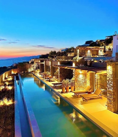 Outdoor pool, open 8:00 AM to 8:00 PM, pool umbrellas, pool loungers. Hotiday Mykonos Fanari