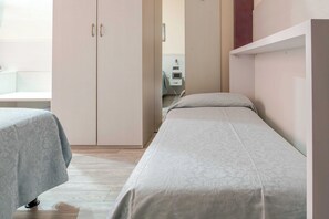 Apartamento | 1 quarto, espaço de trabalho para notebook, roupa de cama