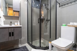 Shower, hair dryer, towels, soap