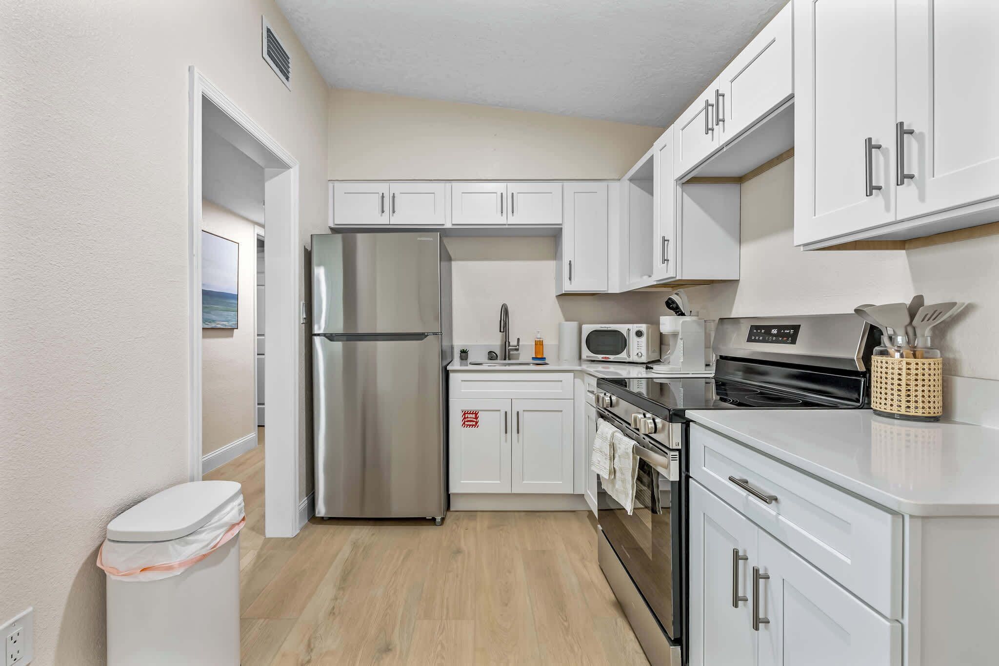 Fridge, microwave, coffee/tea maker, toaster