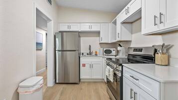 Fridge, microwave, coffee/tea maker, toaster