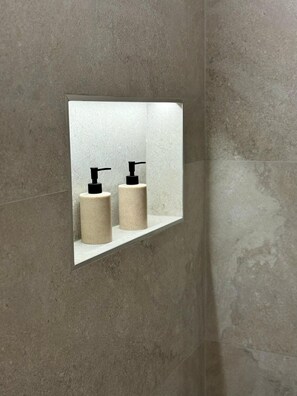 Hair dryer, towels, soap, toilet paper
