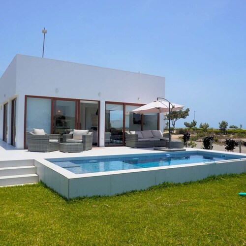 Beachfront Elegance: Private Pool & Steps to Shore