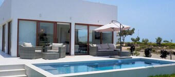 Beachfront Elegance: Private Pool & Steps to Shore