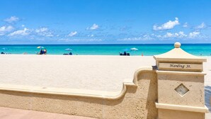 A beach with a sign reading 'Harding St.' - Hollywood Beach 1BR | Short Walk to the Sand (Hollywood)